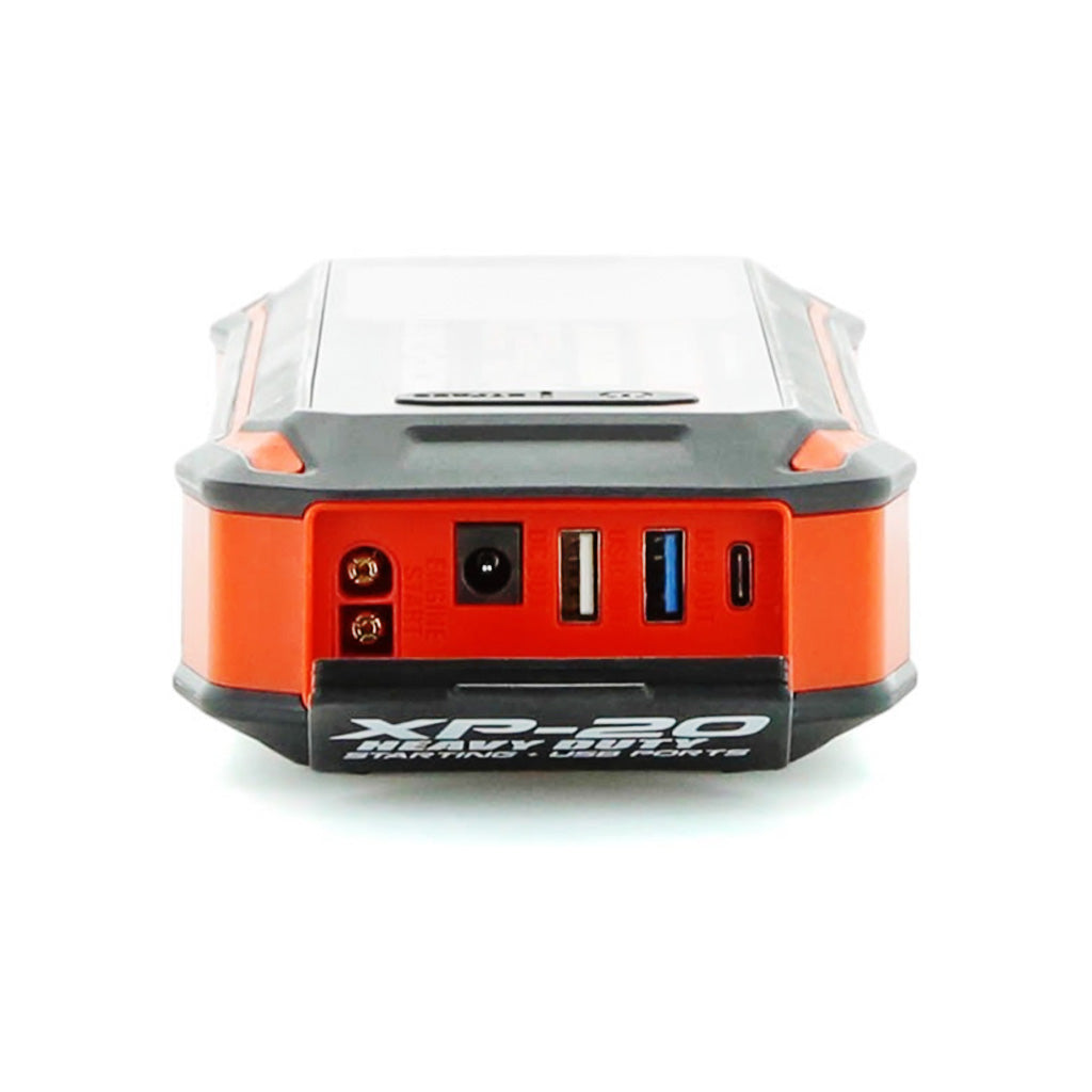 Orange and black jump starter device with multiple ports on a white background
