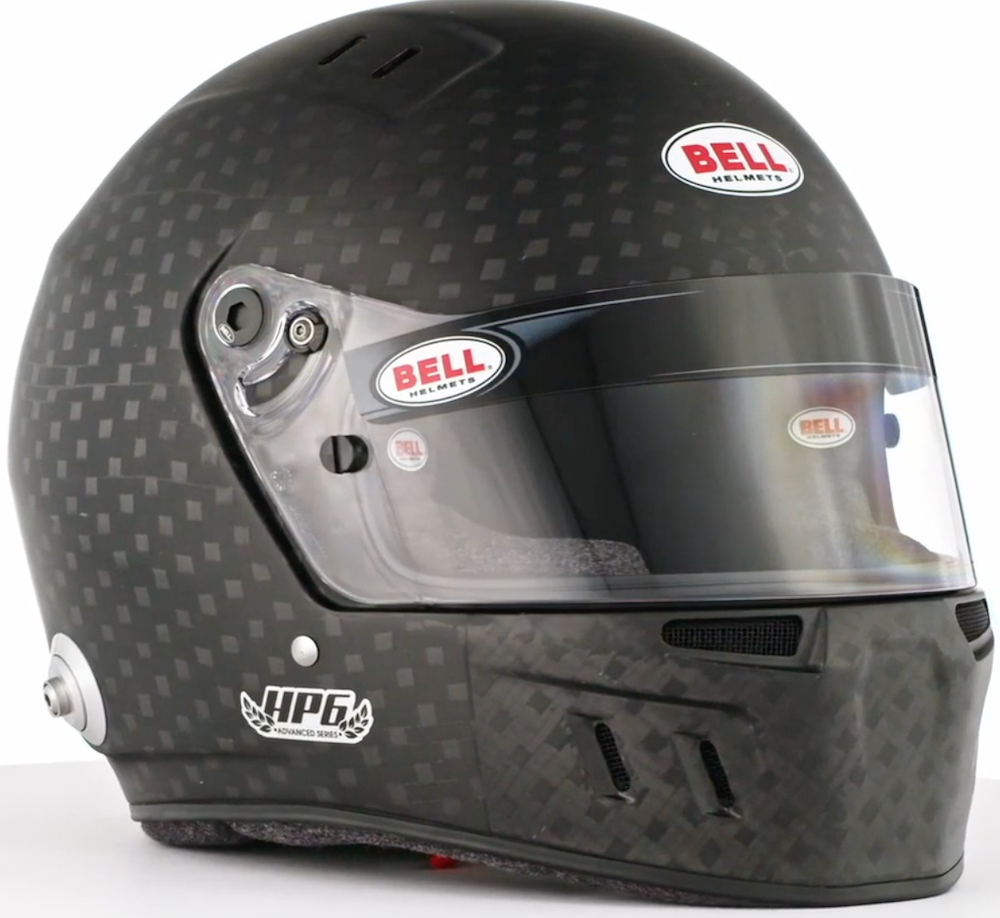 High-Resolution Bell HP6 RD-4C/EC Carbon Fiber Racing Helmet - 3/4 View Image Examine every intricate detail with this high-resolution side view image of the Bell HP6 8860-2018 Carbon Fiber Helmet, highlighting its cutting-edge features.