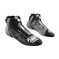 Thumbnail for Pair of black and gray racing shoes with OMP branding on a white background