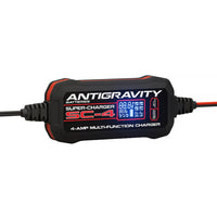 Thumbnail for Compact Antigravity SC-4 battery charger with LCD display showing charge status