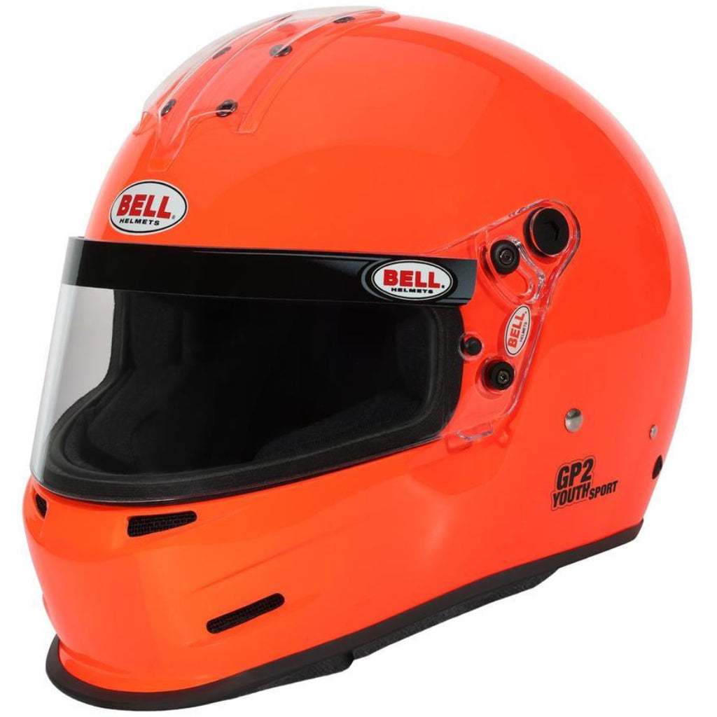 Front right angle view of Bell GP2 Youth Sport karting helmet in bright orange with clear visor installed