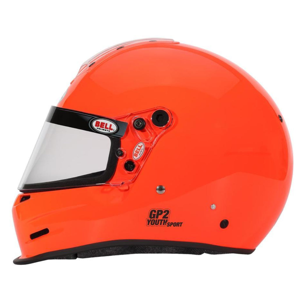 Right side profile of Bell GP2 Youth Sport orange youth racing helmet showing visor pivot and shell shape