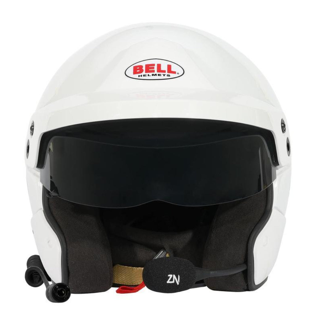 Front view of Bell MAG-10 Rally Sport white helmet highlighting open-face design, tinted visor, and boom microphone image