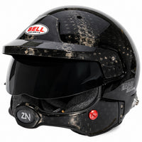 Thumbnail for Bell MAG-10 Rally Ultra carbon fiber racing helmet shown from the front three-quarter angle on a white background