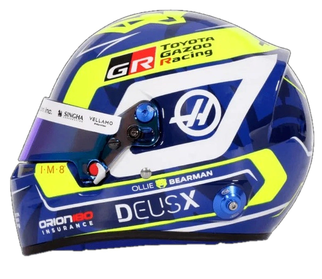 Bell Oliver Bearman 2026 F1 mini helmet left side view with Haas, Toyota Gazoo Racing and Bearman graphics