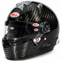 Thumbnail for A Bell RST Ultra full-face racing helmet in a glossy black carbon fiber pattern, featuring a clear visor and multiple red and white Bell helmets logos.
