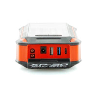 Thumbnail for Orange and black jump starter device with multiple ports on a white background