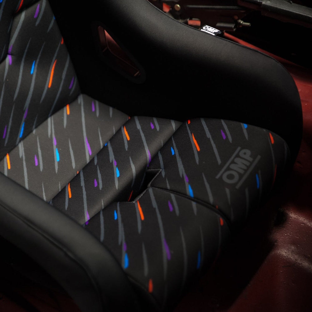 OMP WRC-R Art Racing Seat bottom cushion and bolsters view installed in a car