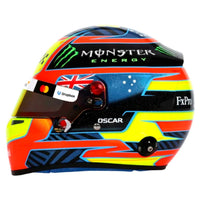 Thumbnail for Oscar Piastri 2026 F1 mini helmet left side view with Australian flag, Monster Energy logo, and Oscar name detail