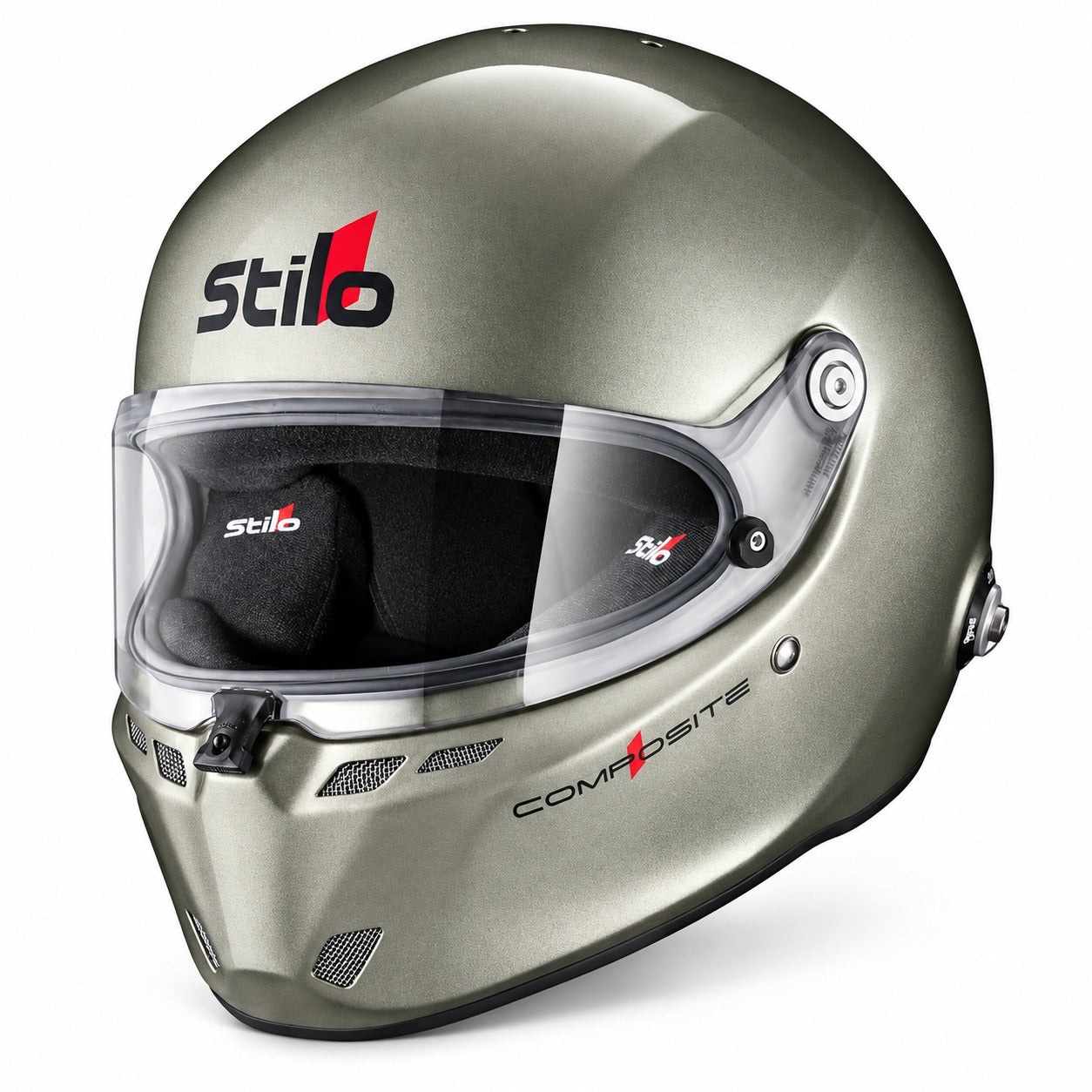 Stilo ST6 FN Composite Auto Racing Helmet in metallic silver, shown in front three-quarter view with clear visor, aerodynamic ventilation ports, black interior padding, and HANS anchor mounting hardware.