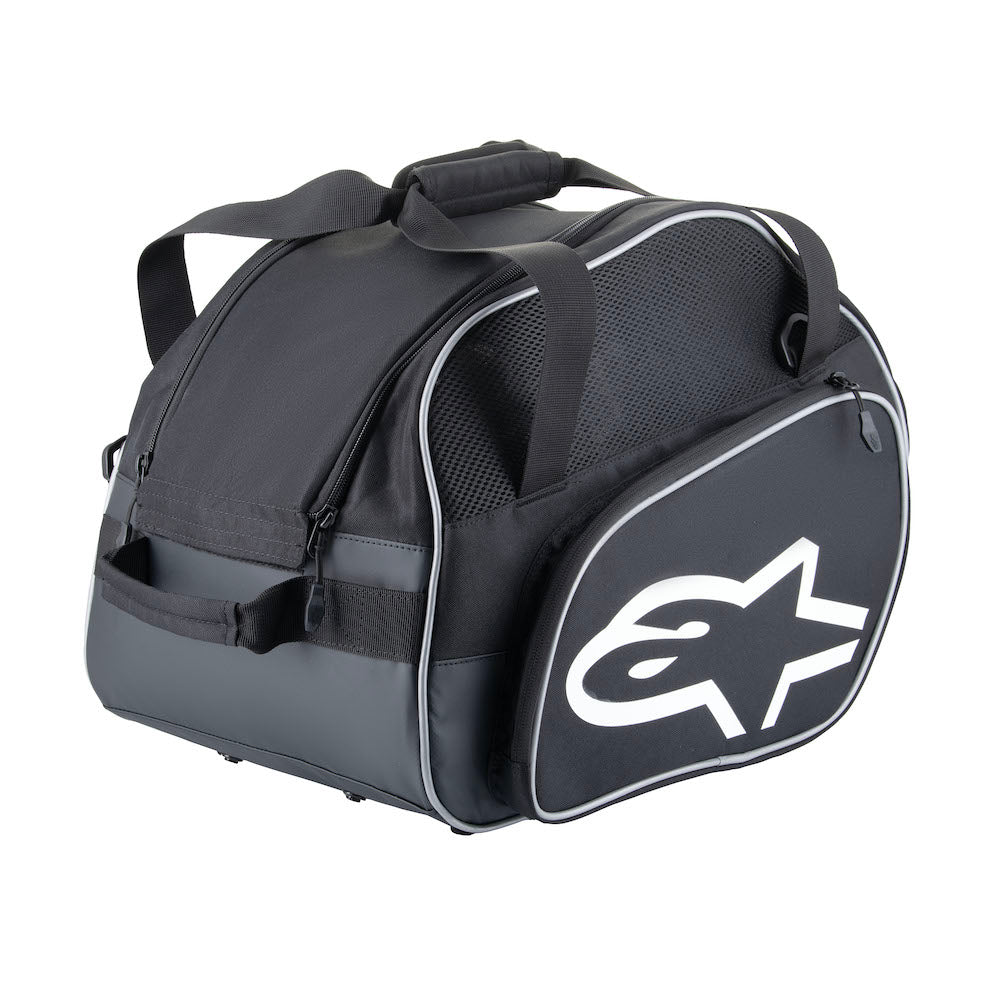 Detailing the Alpinestars Flow v3 Helmet Bag's durable construction and airflow system, a must-have accessory for any dedicated motorsports racer.