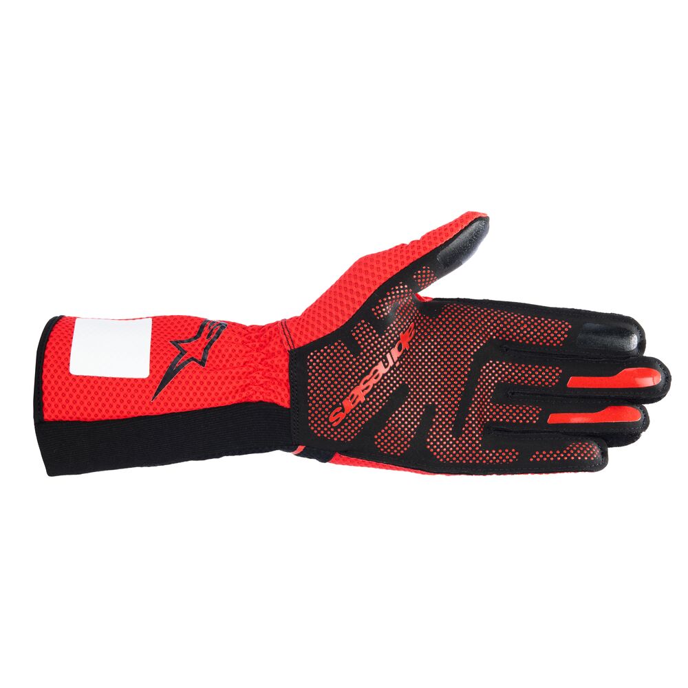 Fingertip detail of the Alpinestars gloves, emphasizing its touchscreen compatibility