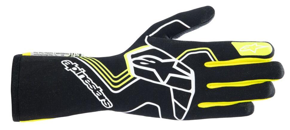 A dramatic shot of the Alpinestars Tech-1 Race v4 Nomex Gloves, symbolizing the pinnacle of racing gear.